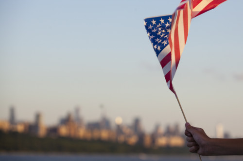 Man waving an American flag